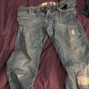 Women’s Distressed Blue Jeans